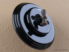 Garby Colonial Aus-Wechsel Porzellandrehschalter schwarz im Einfachrahmen Porzellan schwarz Knebel Messing patiniert