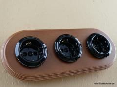 Garby Colonial 3fach Steckdose Porzellan schwarz, 3fach Rahmen Holz Buche honigfarben, seitlich